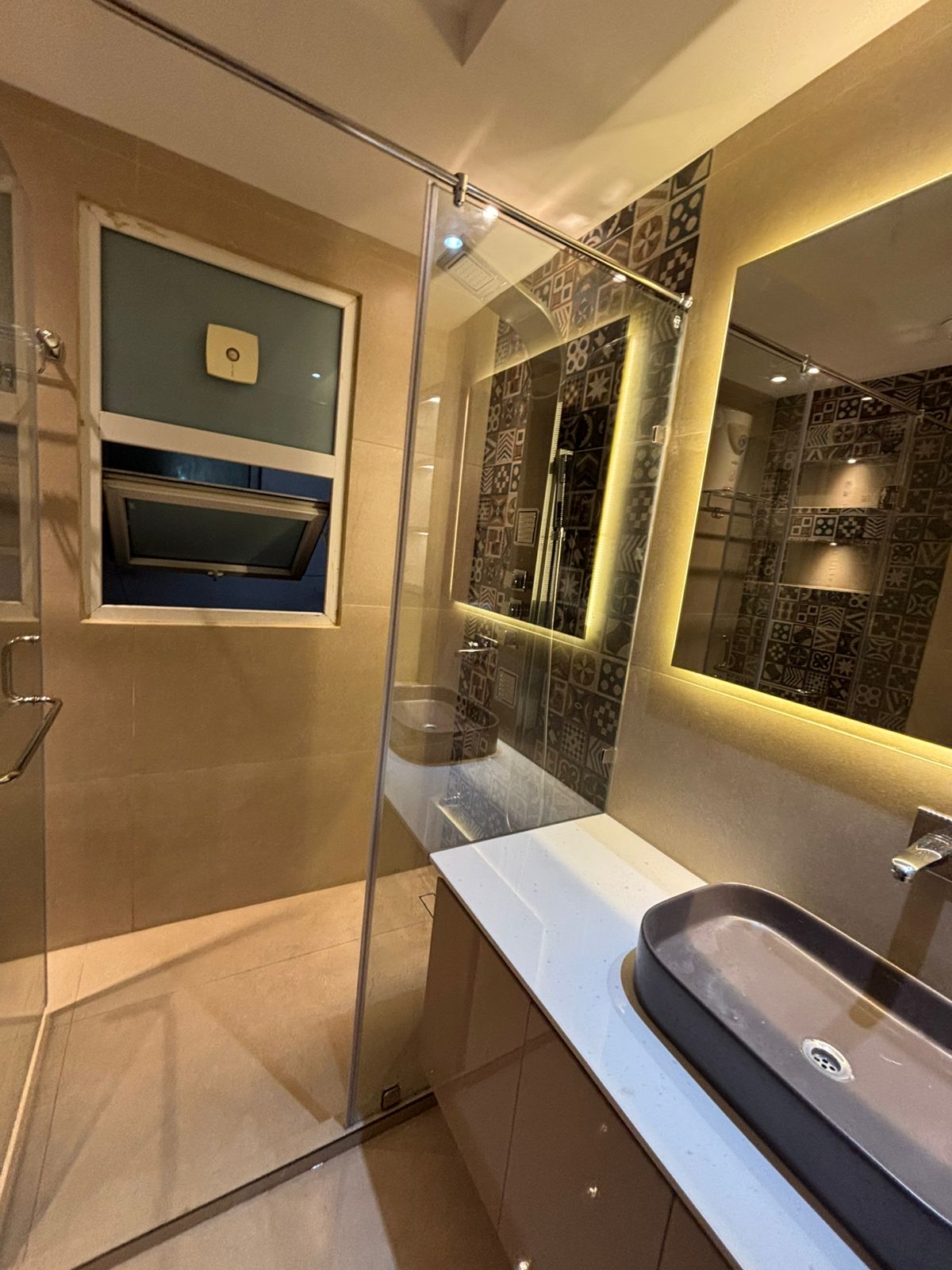 Aluminium window with glass shower enclosure