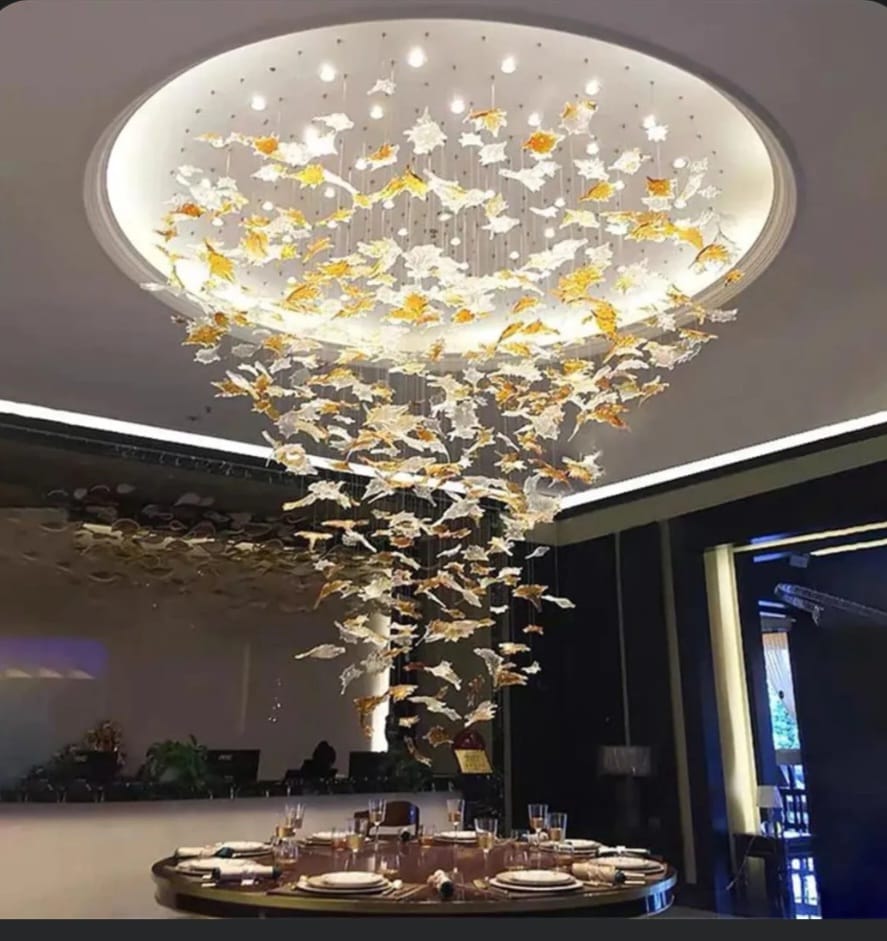 Premium dining space with designer leaf chandelier