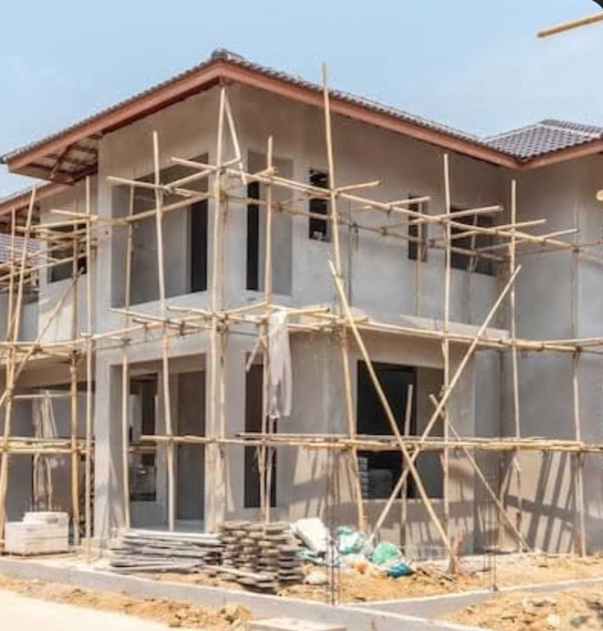 House under construction with scaffolding