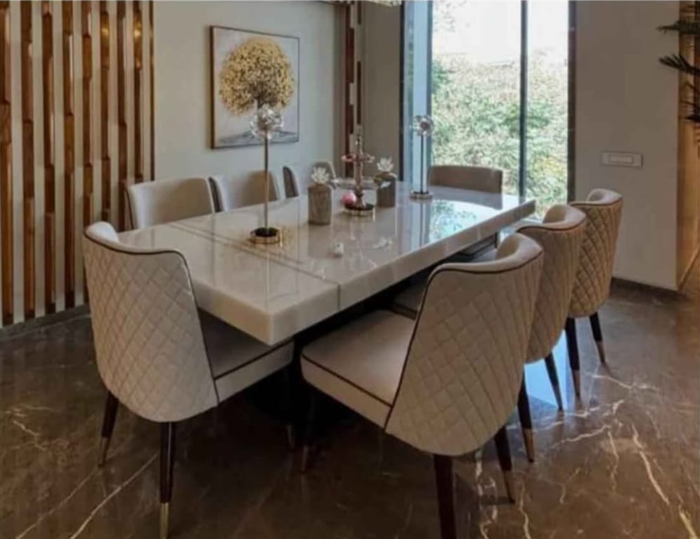 Finished luxury dining room interior by SHAN DEVELOPER