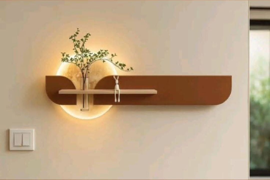 Decorative backlit wall shelf showing lighting work
