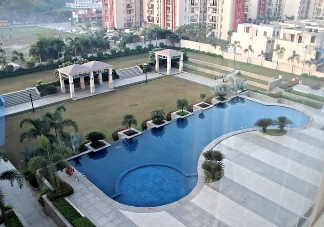 Residential society with pool and garden, aerial view